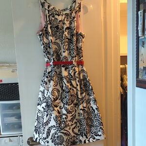 Chic Black and White Patterned Dress with Red Belt